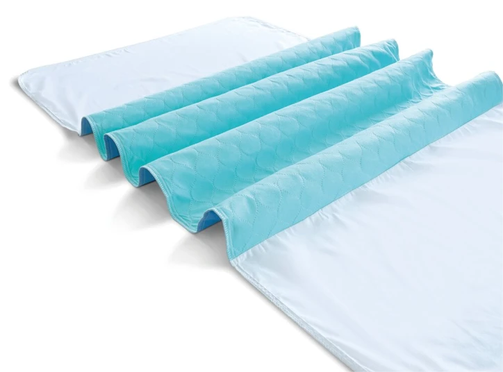 Alèse de lit réutilisable avec rabats