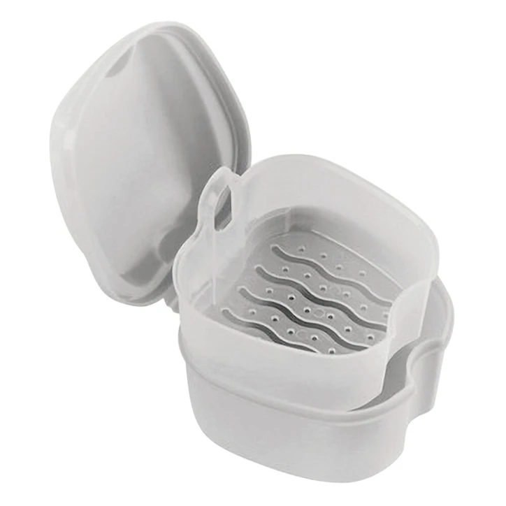 Boîte à dentier avec égouttoir