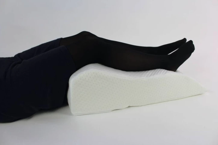 Coussin réhausse jambes