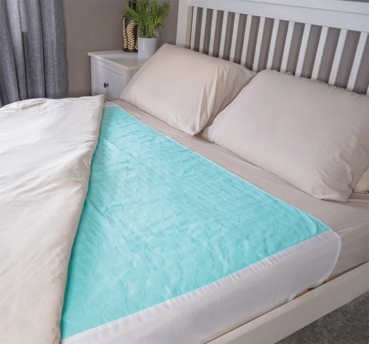 Alèse de lit réutilisable avec rabats